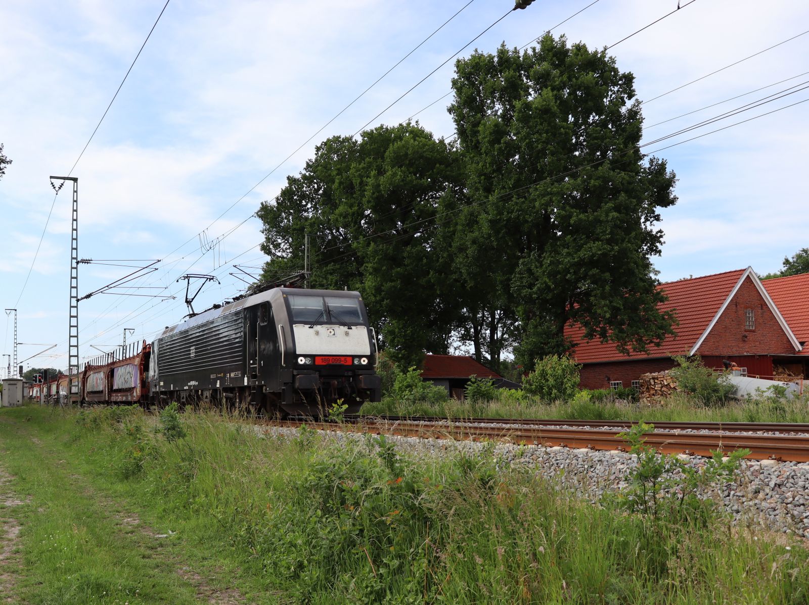 DB Cargo Lokomotive 189 099-5 (91 80 6189 099-5 D-DB) Devesstrae, Salzbergen 03-06-2022.

DB Cargo locomotief 189 099-5 (91 80 6189 099-5 D-DB) Devesstrae, Salzbergen 03-06-2022.