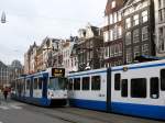 GVBA TW 838 und 828. Damrak, Amsterdam 08-01-2014.

GVBA tram 838 en 828. Damrak, Amsterdam 08-01-2014.