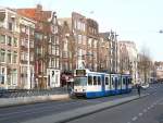 GVBA TW 910 Nieuwezijds Voorburgwal, Amsterdam 22-01-2014.

GVBA tram 910 Nieuwezijds Voorburgwal, Amsterdam 22-01-2014.