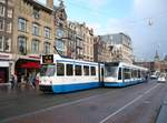 amsterdam-gvb/541864/gvb-tw-834-und-2036-damrak GVB TW 834 und 2036 Damrak, Amsterdam 03-02-2016.

GVB tram 834 en 2036 Damrak, Amsterdam 03-02-2016.