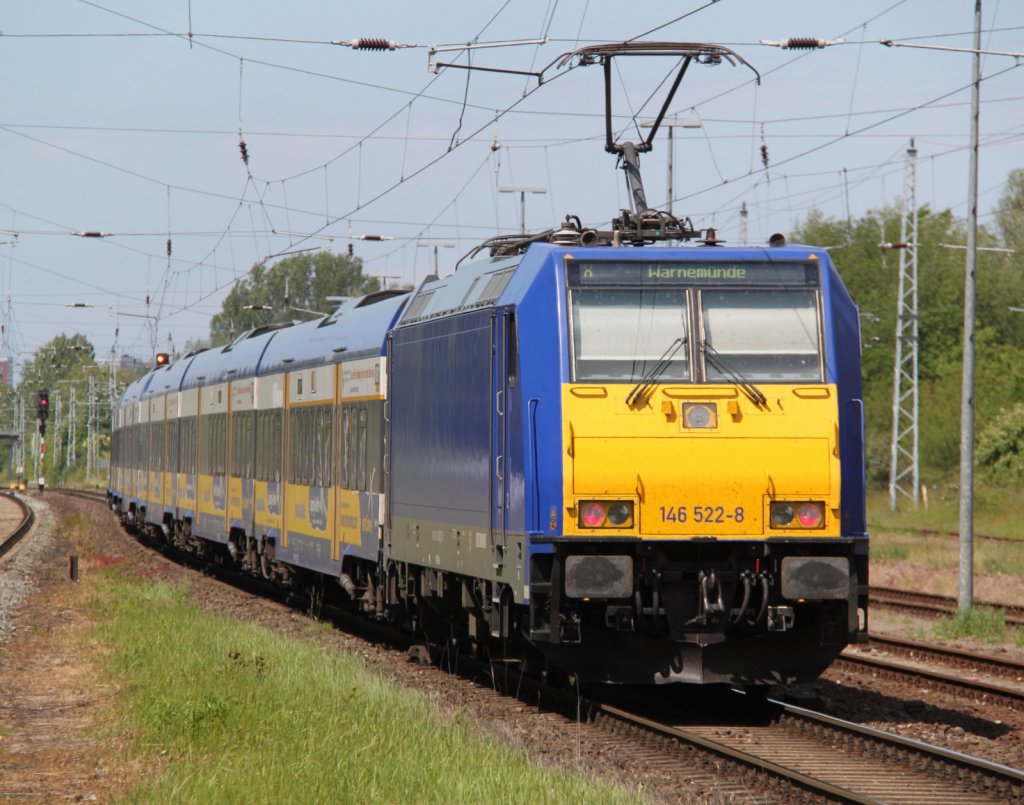 146 522-8 mit X 68903 von Leipzig Hbf nach Warnemnde bei der Durchfahrt in Rostock-Bramow.08.06.2012