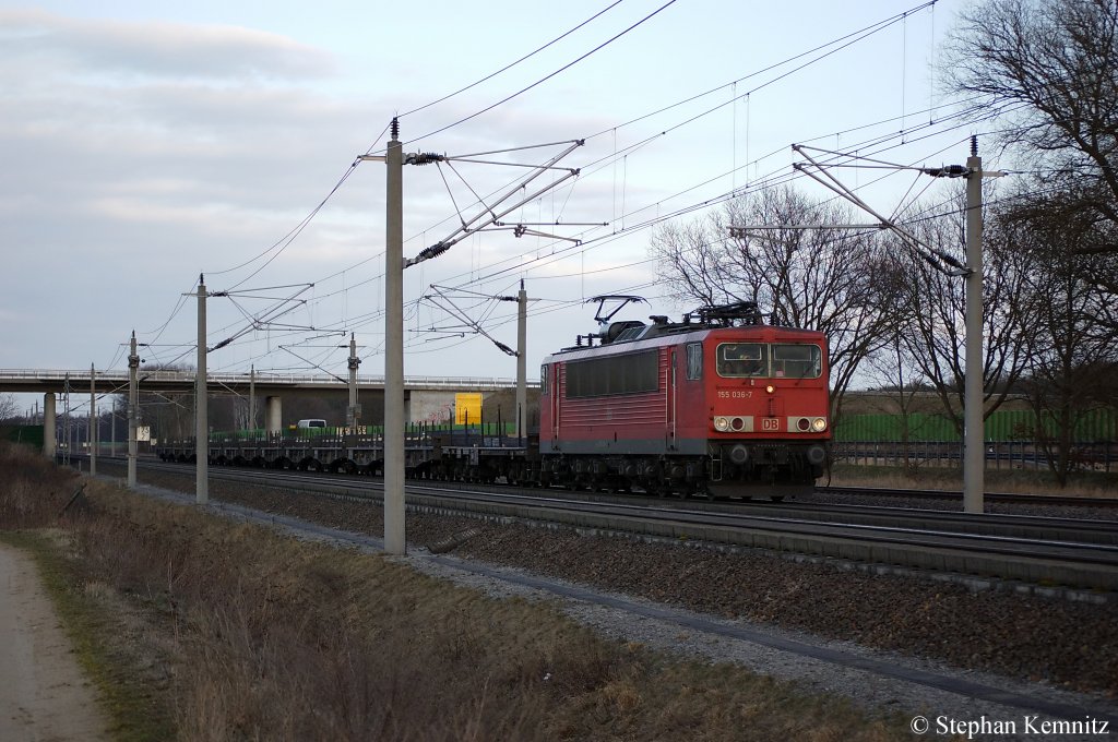 155 036-7 mit Flachwagen zwischen Growudicke und Rathenow in Richtung Stendal unterwegs. 24.03.2011