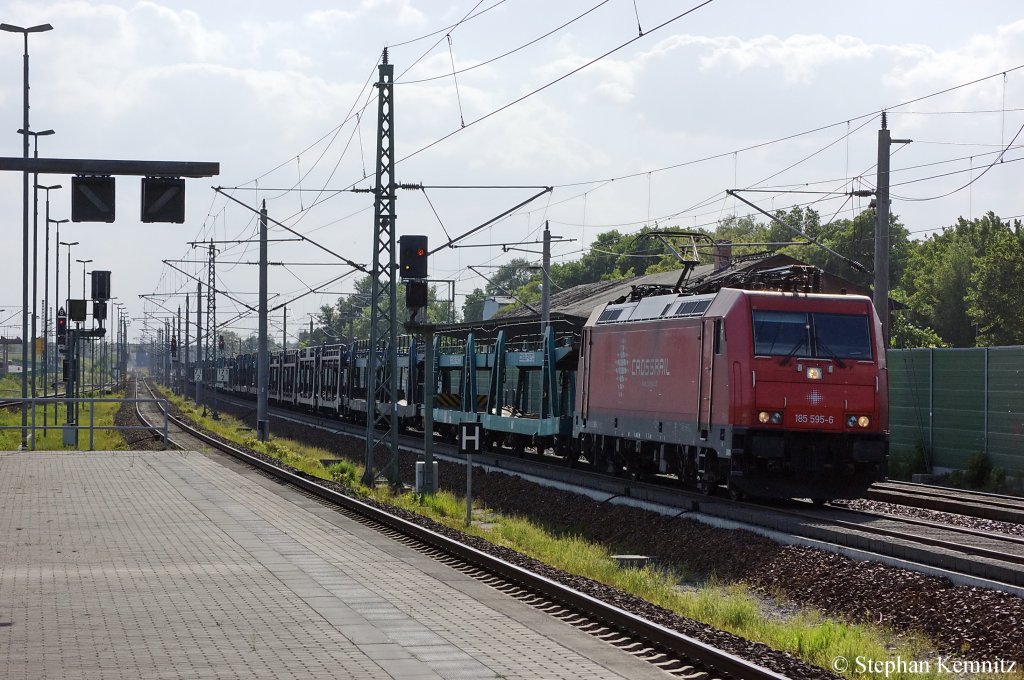 185 595-6 Crossrail mit leeren Autotransportzug in Rathenow in Richtung Wustermark unterwegs. 24.05.2011