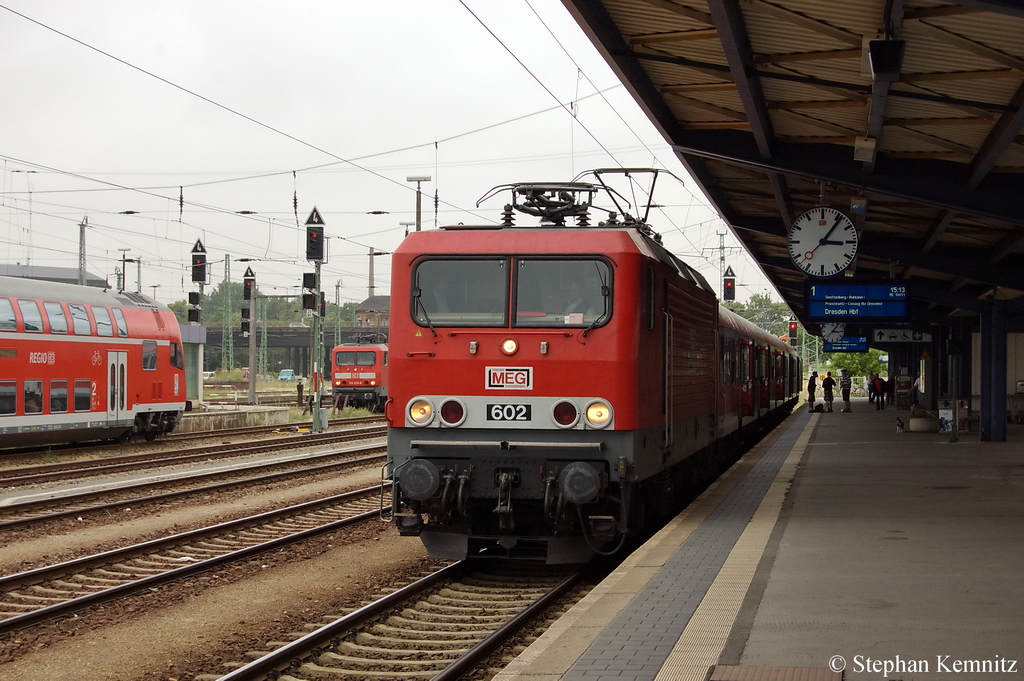 602 (143 204-6) MEG mit dem RE18 (RE 18411) nach Dresden Hbf in Cottbus. 30.06.2011