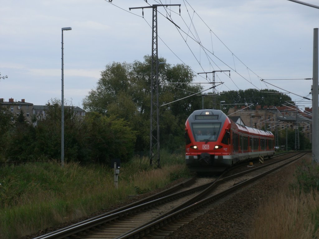 Nach der Ausfahrt aus den Stralsunder Hbf fuhr 429 028,am 17.September 2011,in die eingleisige Strecke nach Rostock ein. 