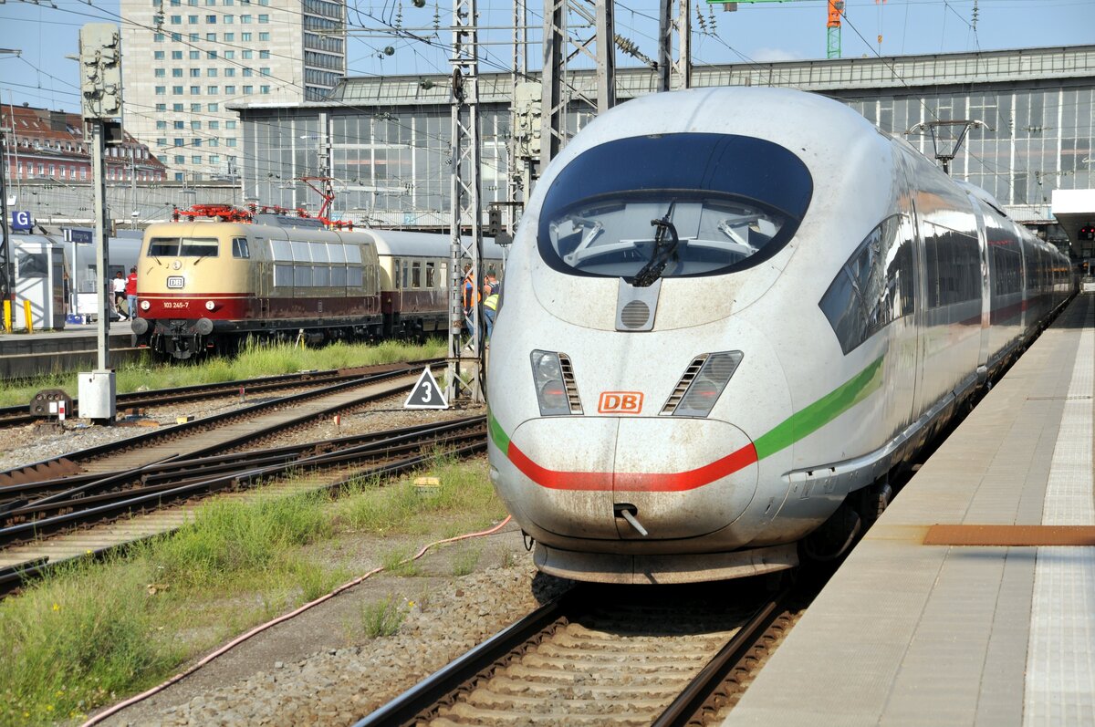 103 245-7 und ICE 3 im Hbf München am 04.06.2022.