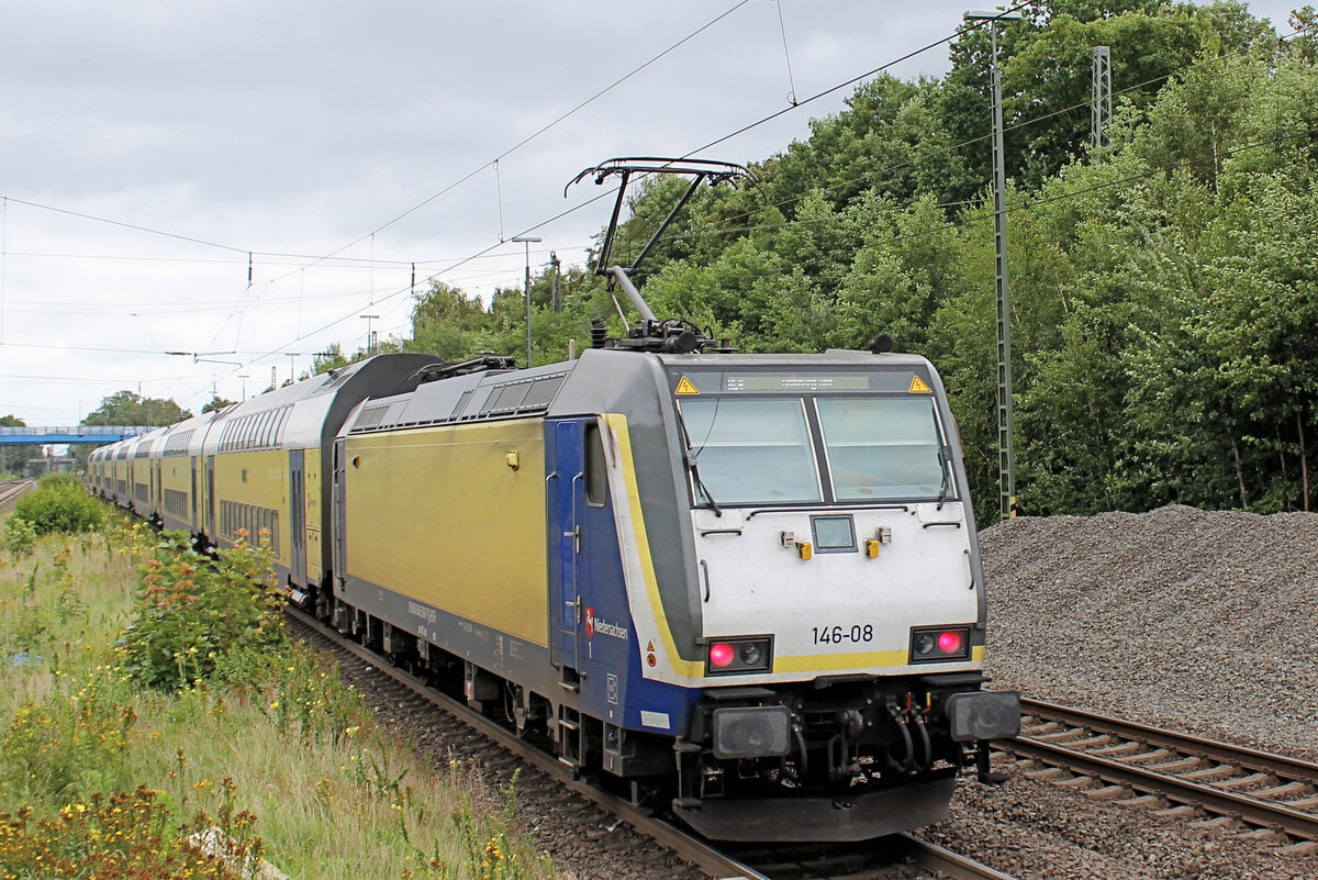 146-08 verlässt am 07.08.2023 den Bahnhof Tostedt.