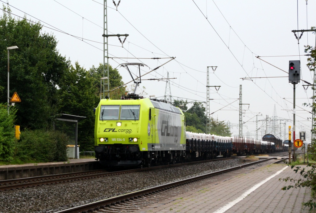 Alphatrain/CFL Cargo 185 534-5(ex OHE)durchfährt hier Jübek mit einem Zementtransport am Haken Richtung Padborg. Jübek 28.08.2012