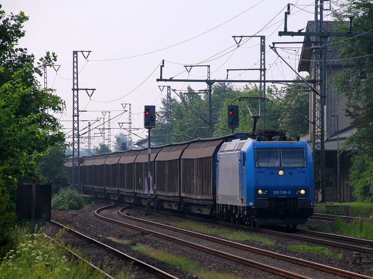 AlphaTrains/TXL 185 518-8 mit dem DGS 49702 aus Lippstadt festgehalten an der Ladestrasse in Jübek. 25.05.2014