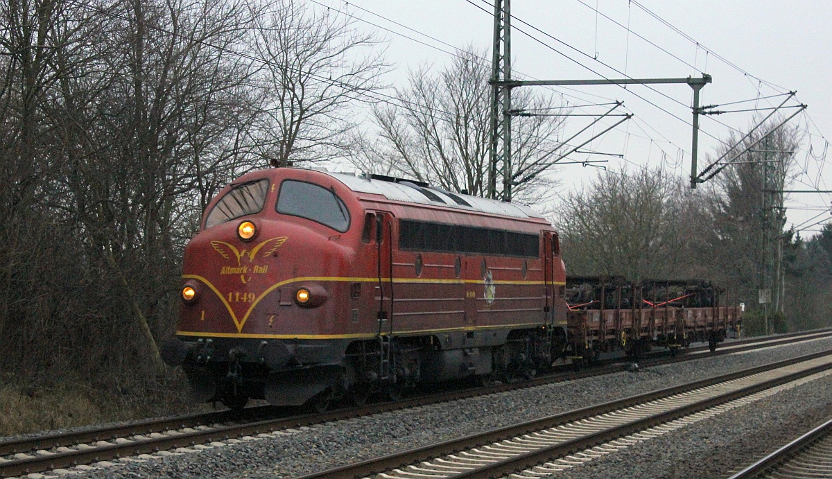 Altmark Rail MY 1149 oder 1227 008-0 mit zwei Kgs-z Wagen beladen mit jeweils einem dreichachsigen Drehgestell(für MX/MY oder CFL 1800) dieselt hier am heutigen Nachmittag durch Schleswig. 21.12.2016