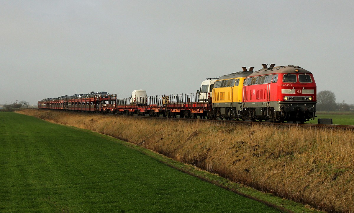 DB 218 385-3(REV/HB X/21.12.16) und die 218 449-7 mit ihrem AS nach Niebüll. Bü Triangel 05.01.2019