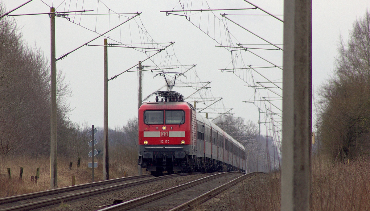 DB/WFL 112 170-6 mit dem D 304 aus Innsbruck kurz vor der Einfahrt in den dänischen Grenzbahnhof Pattburg/DK aufgenommen in Harrislee. 12.03.2023 I