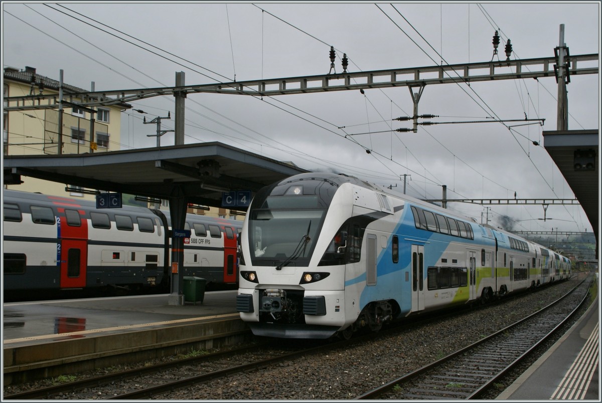 Der fr die Westbahn bestimmte Stadler Kiss ET 4010 93 85 4010 002-2 CH WSTBA in Sargans. 
11. Sept. 2011