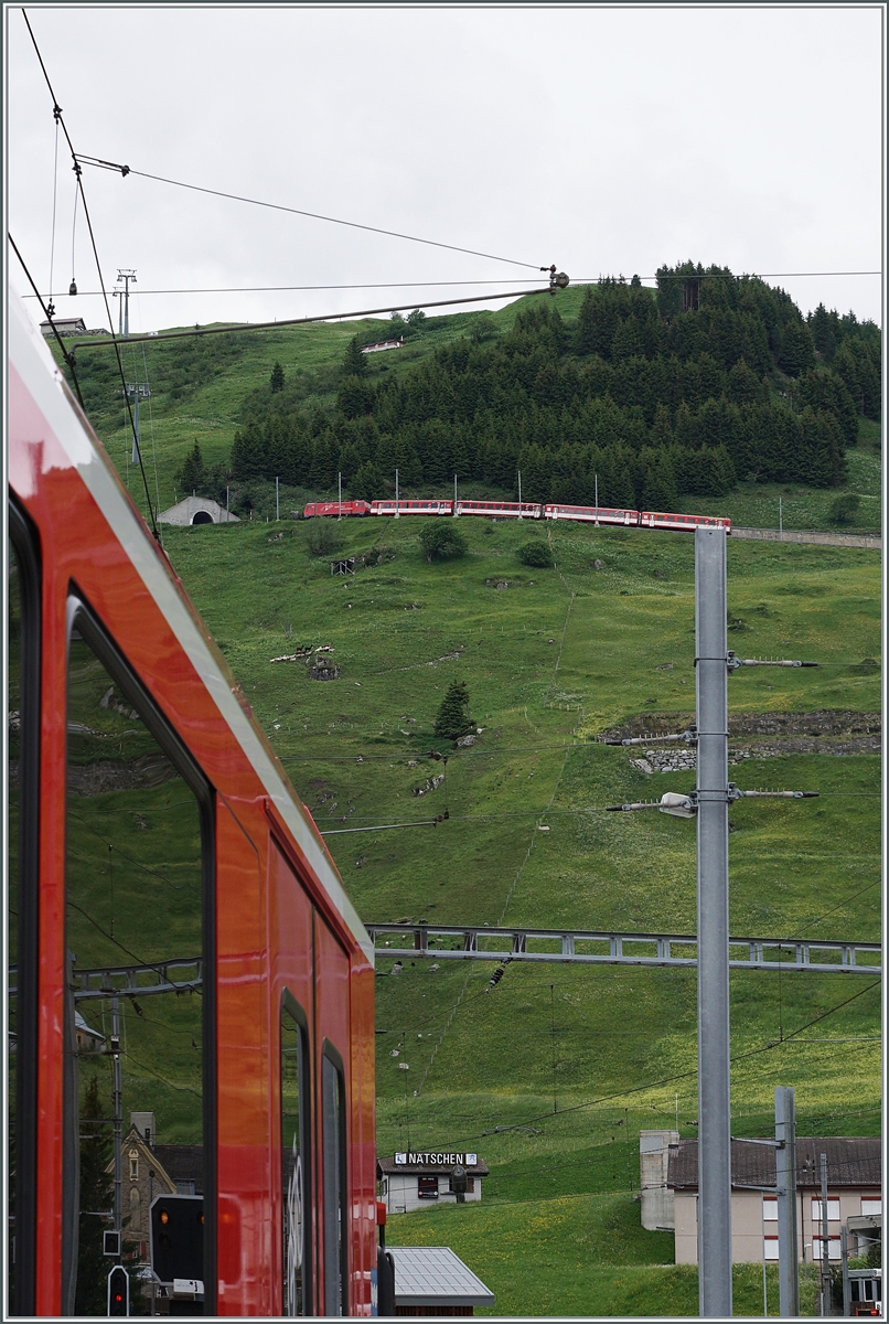 Die MGB  HGe 4/4 II 102 ist wenige Minuten nach der Abfahrt in Andermatt mit ihrem Zug in Richtuzng Oberalp Pass unterwegs. 

23. Juni 2021