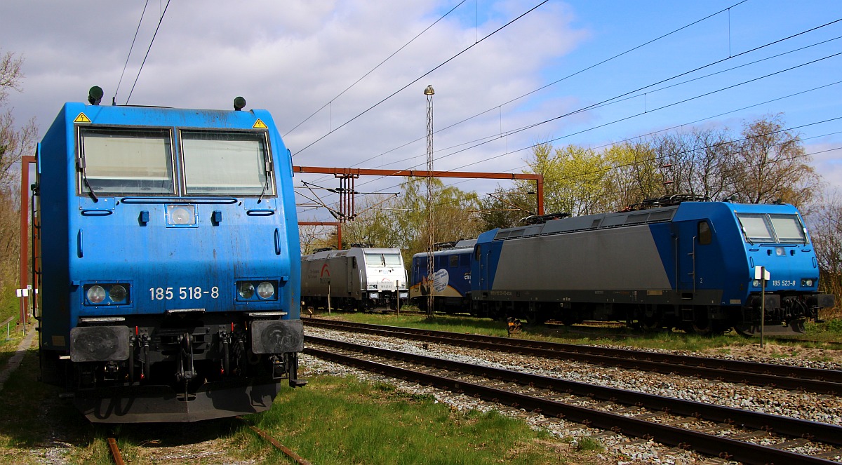 Im südlichen Bereich abgestellt: ATLU 185 518-8 (REV/Fw510/22.04.21), TXL 185 418, EVB 140 761 und ATLU 185 523-8 (REV/Fw510/17.03.17). Pattburg/DK 29.04.2022