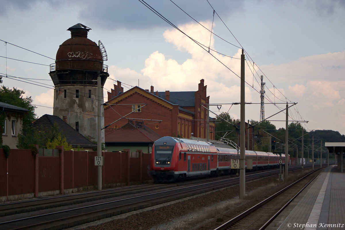 IRE  Berlin-Hamburg-Express  Enlastungszug (IRE 18588) von Berlin Ostbahnhof nach Hamburg Hbf, bei der Durchfahrt in Rathenow und geschoben hatte die Rostockerin 112 152-4 am 07.09.2014. Dieser Entlastungszug wird jetzt jeden Sonntag bis zum Fahrplanwechsel im Dezember 2014 geben. Ab Stendal nimmt dieser zweite IRE, aber den Weg über Wittenberge, Hagenow Land und Schwarzenbek nach Hamburg.