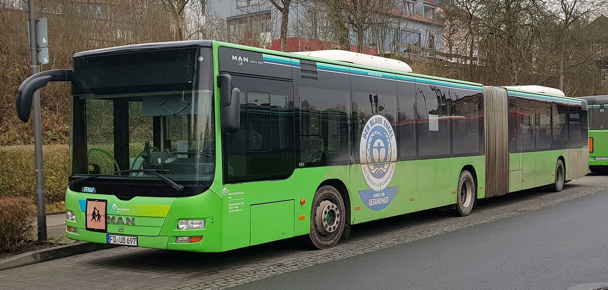 MAN Lion`s City (697) von Rh�nEnergie steht am Bahnhof H�nfeld im Dezember 2021