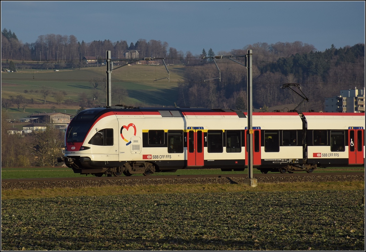 RABe 521 022 'Lausen' in Hendschiken. Januar 2022. 