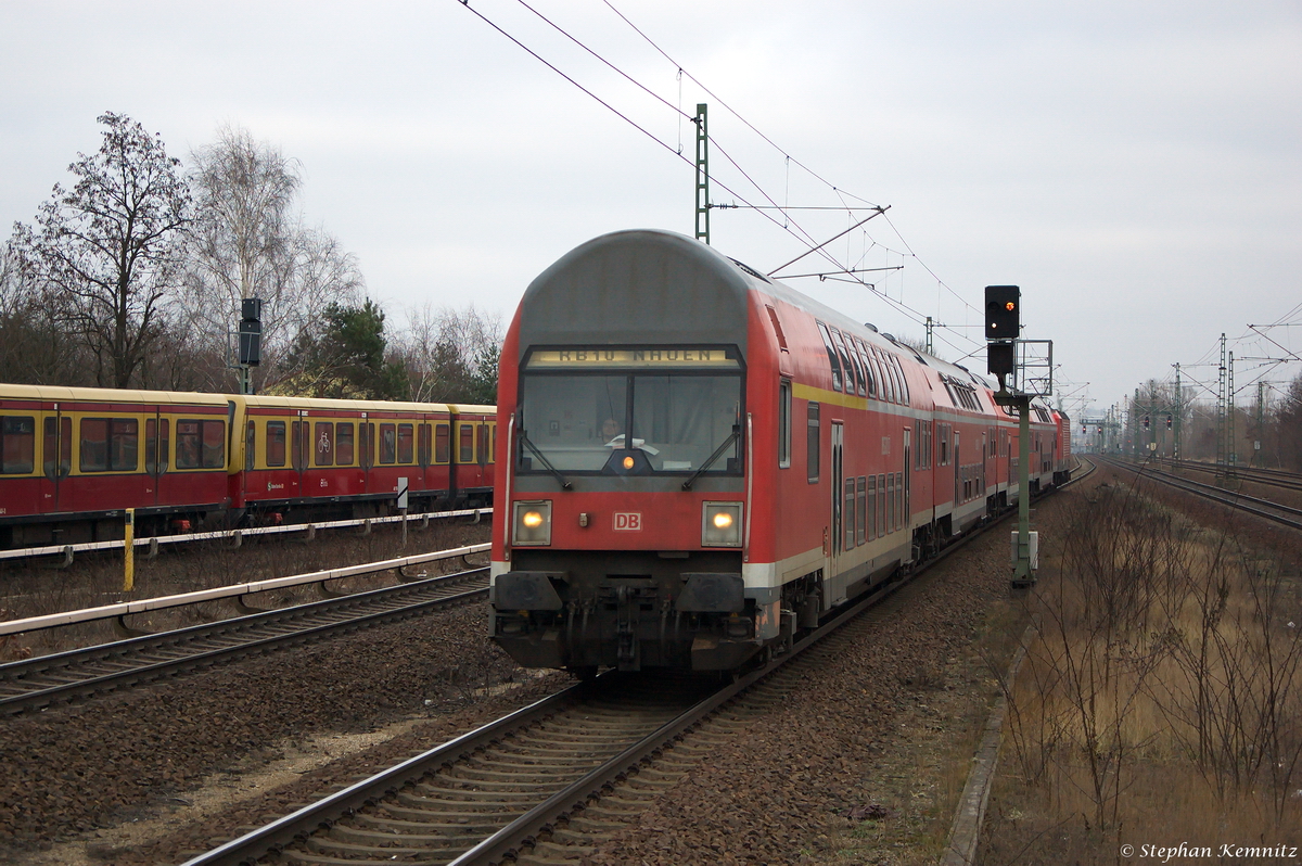 RB10 (RB 18968) von Berlin Hbf (tief) nach Nauen, bei der Einfahrt in Berlin Jungfernheide und geschoben hatte die 143 848-0. 24.01.2015