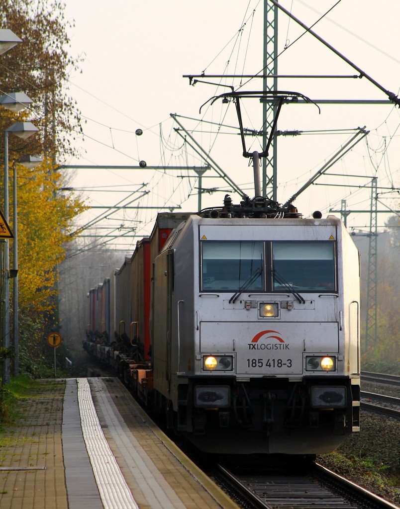 TXL 0185 418-3 kam aus Richtung Hamburg mit ihrem  Lauritzen  KLV durch Schleswig gefahren. 23.11.2014