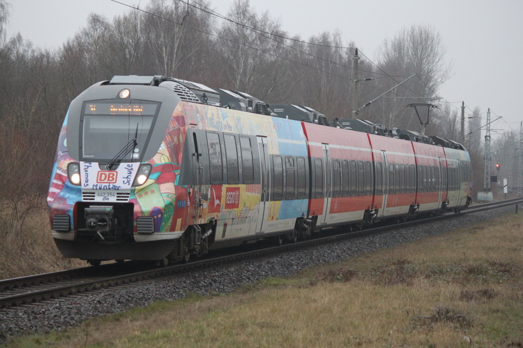 Werbehamster 442 354 als S1(Warnemünde-Rostock)bei der Einfahrt in Rostock-Lichtenhagen.02.02.2019