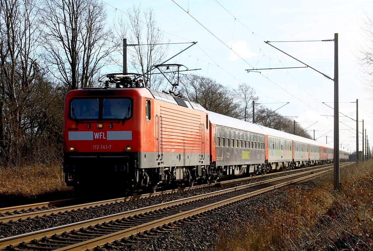 WFL 112 141-7 mit Snälltoget D 304 Innsbruck-Malmö Central, Harrislee Grenze am 19.02.2023