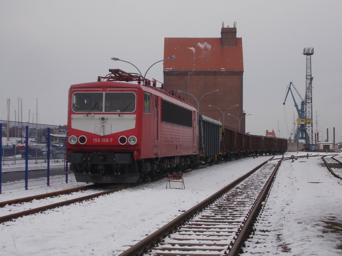 WFL 155 159,am 22.Januar 2018,mit dem leeren Gipszug nach Peitz,im Stralsunder Nordhafen.