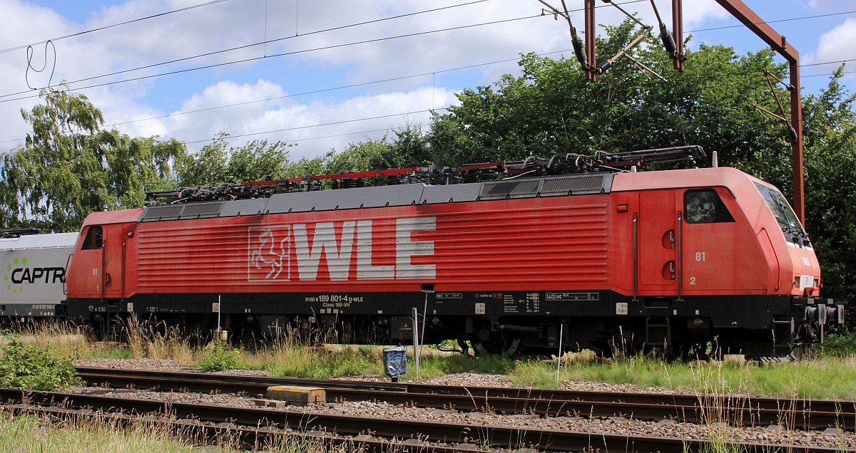 Zu Gast im Norden die WLE 81 oder 189 801-4, REV/WLE/05.07.18 die wohl wieder Tunnelbauteile angeliefert hat und nun auf die Rückleistung wartet. Pattburg/DK 30.07.2020