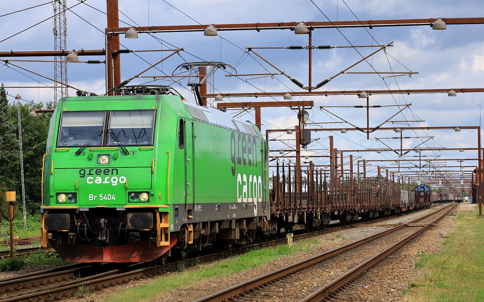 GreenCargo Br 5404 mit leerem Langschienen Zug Pattburg 14.07.2023