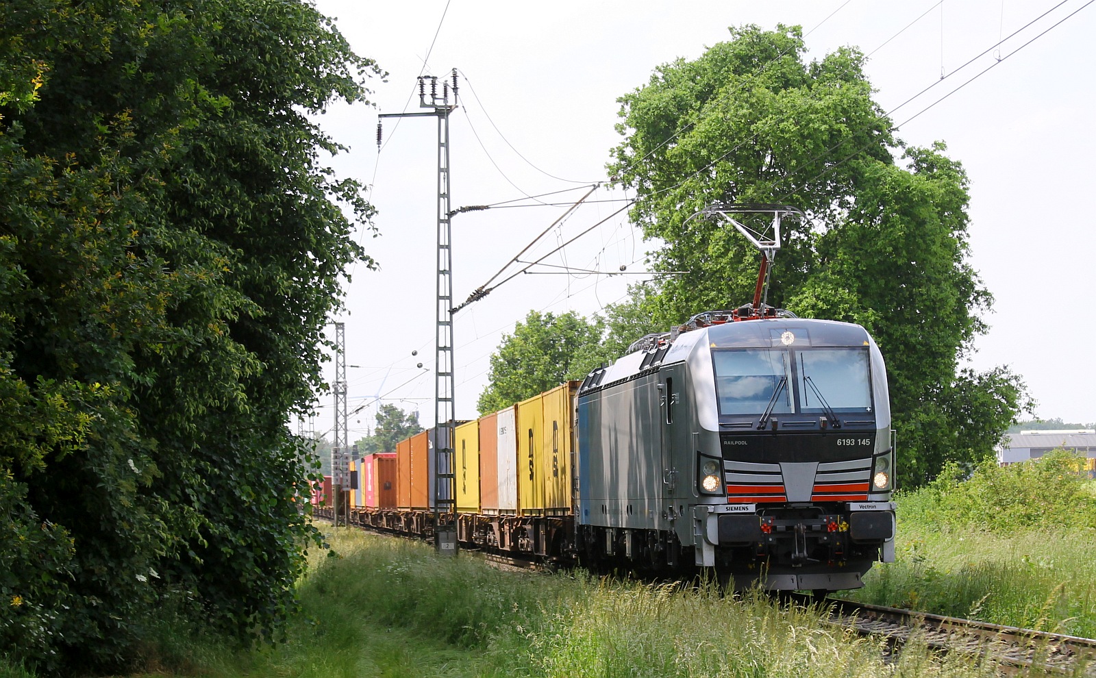 RP 6193 145-0, REV/MMAL/28.09.23, mit Containerzug bei Boisheim 06.06.2024