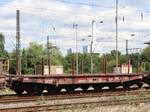 Sammnps DB Cago Drehgestell-Flachwagen mit Nummer 31 RIV 80 4827 201-3 Gterbahnhof Oberhausen West 11-07-2024.

Sammnps zesassige platte wagen van DB Cargo met nummer 31 RIV 80 4827 201-3 goederenstation Oberhausen West 11-07-2024.