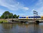 NS SLT-4 Triebzug 2409  Rijn en Schiekanaal  Eisenbrücke. Leiden 08-06-2016.

NS SLT-4 treinstel 2409 Rijn en Schiekanaal spoorbrug. Leiden 08-06-2016.