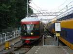 .Museumzug mat'46 TW 273 und mat'54 TW 386 einfahrt Amsterdam Centraal Station 20-09-2014.