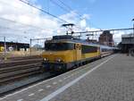 NS Lokomotive 1750 mit Intercity von Berlijn nach Amsterdam. Gleis 7 Amersfoort Centraal 25-02-2020.

NS locomotief 1750 met intercity uit Berlijn naar Amsterdam. Spoor 7 Amersfoort Centraal 25-02-2020.