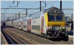 . Der ICe 1511 Knokke/Blankenberge - Tongres (Tongeren) fhrt am 14.02.2009 in den Bahnhof Gent Sint Pieters ein. (Jeanny) 

Dieser Zug besteht aus zwei Loks der Srie 27 und M 6 Wagen (davon zwei M 6 Steuerwagen). Ein Teil des Zuges kommt aus Knokke, der andere aus Blankenberge und in Brugge werden sie zusammengekuppelt, um gemeinsam nach Tongres (Tongeren) zu fahren.