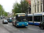 Connexxion Bus 3876 Nieuwezijds Voorburgwal Amsterdam 27-05-2011.