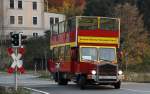 historischer Doppelstockbus MAN als Schsisch-bhmischer Nationalpark-Express, Frank Nuhn Freizeit und Tourismus Knigstein, fotografiert am Bahnbergang in Bad Schandau in der Schsischen Schweiz am