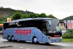 Setra 516 HD von Pfleger Reisen aus Niedersterreich am 17.Mai 2014 in Krems unterwegs.