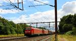 DBCSC EG Doppel mit der fhrenden EG 3110 und langem Gterzug aus Pattburg kommend auf dem Weg nach Norden.