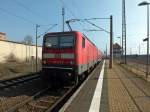 143 327 verlsst mit einem RE nach Halle (Saale) den Bahnhof Nordhausen.