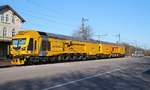 DB Bahnbau Schienenfräszug Linsinger Rail mailing train MG 31(Schweres Nebenfahrzeug D-DB 9980 9427 009-2, REV/Linsinger/02.01.2013, 183t)abgestellt an der Ladestrasse des Haltepunktes Jübek