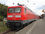 112 185-4 mit RE 18491 von Warnemünde nach Berlin Hbf(tief)stand am Mittag abgerüstet in Warnemünde.