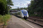 Eine RB48 in Richtung Kln, bestehend aus 9442 154 und 351 hat Einfahrt in den Wuppertaler Hauptbahnhof.