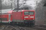 112 141-7+RE 21009 Kiel-Hamburg bei der Einfahrt im Hamburger Hbf.10.03.2012