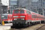 218 428-1 mit RB 27043 von Mnchen Hbf nach Mhldorf(Oberbay)kurz vor der Ausfahrt im Hauptbahnhof Mnchen.02.04.2012 