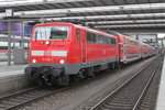 111 052-7 mit RB 59059(Mnchen-Nrnberg)kurz vor der Aufahrt im Mnchener Hbf.27.07.2016