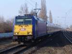 146 519-4 mit InterConnex68904 von Warnemnde Richtung Leipzig Hbf bei der Durchfahrt am S-Bahnhof Rostock-Holbeinplatz.(22.02.2011)