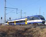 OLA79765 von Rostock Hbf Richtung Gstrow bei der Ausfahrt im Rostocker Hbf.(22.02.2011)