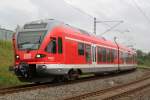 DB-Regio Flirt als RE 13008 von Sassnitz nach Rostock Hbf kurz vor der Einfahrt im Rostocker Hbf.(05.07.2011)