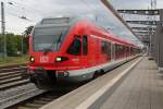 RE 13008 von Sassnitz nach Rostock Hbf bei der Einfahrt im Rostocker Hbf(26.07.2011)